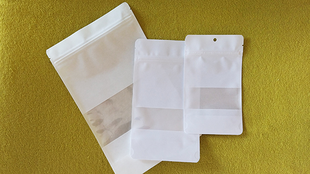 Doy Pack white pouches with zipper