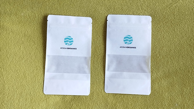 Branded white kraft pouches with zipper and window