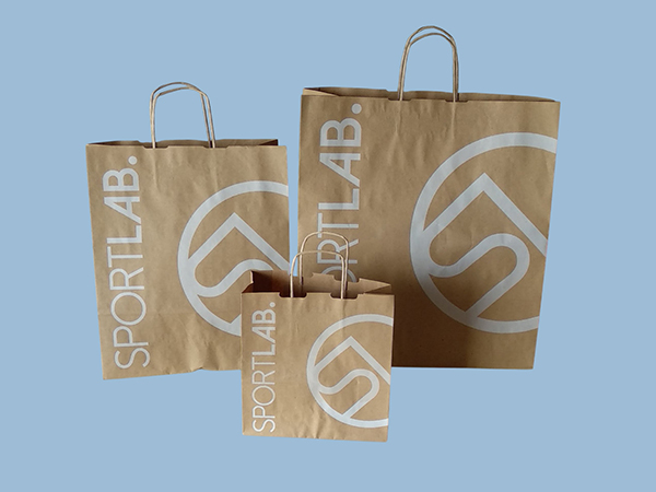 Брандирани крафт торбички с усукани или плоски дръжки