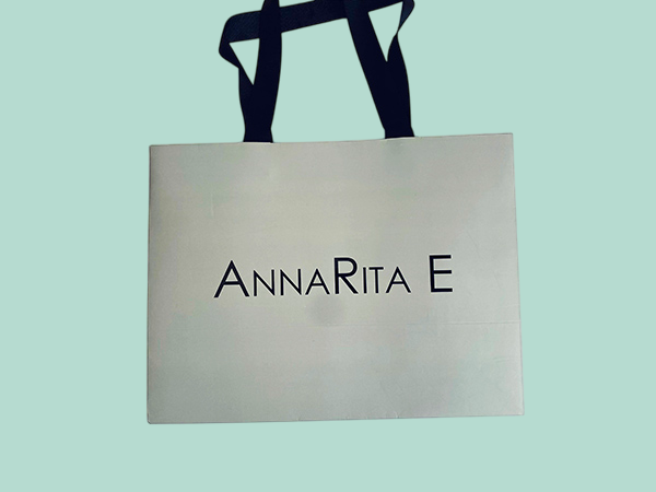 Luxury branded paper bags with hidden ribbon handles