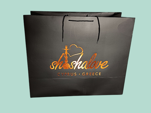 Luxury branded paper bags with cord and ribbon handles