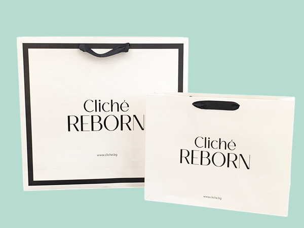 Luxury branded paper bags with ribbon handles