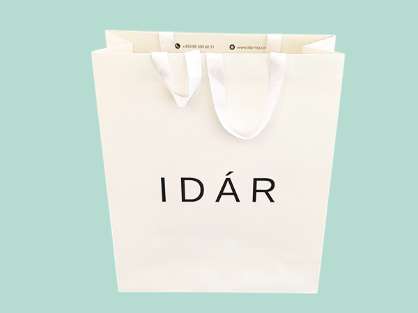 Personalized luxury branded paper bags with grosgrain ribbons
