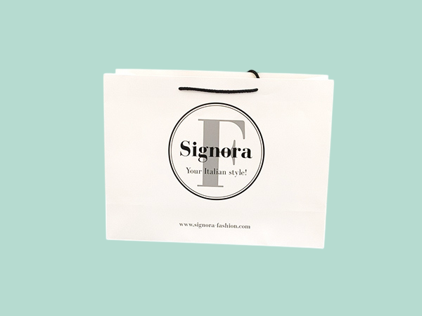 Luxury branded paper bags with cord handles
